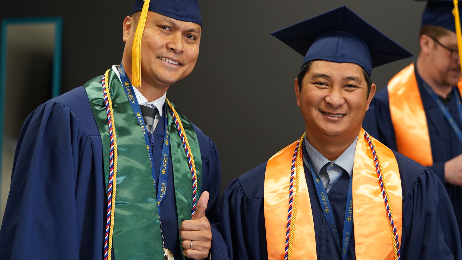 Laurus College graduates celebrating at commencement