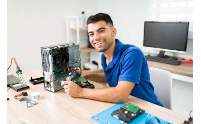 Student works on computer components
