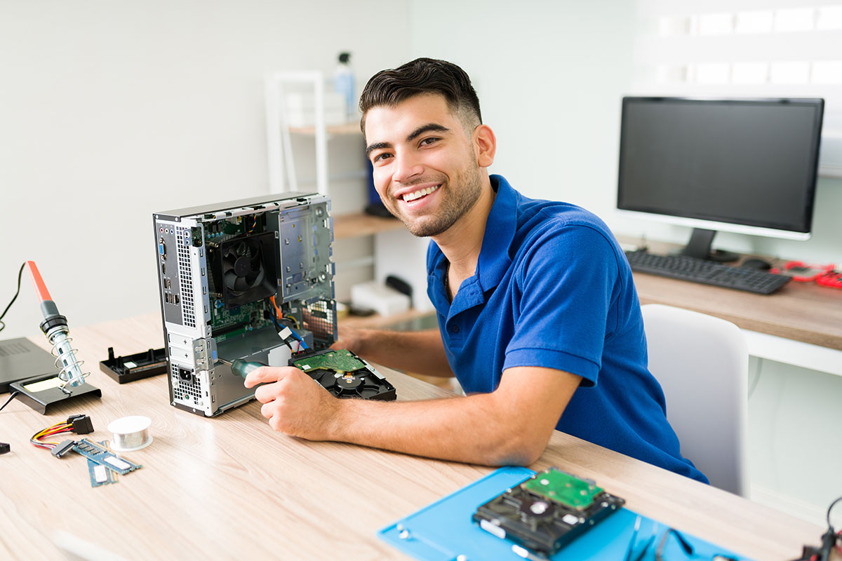 Student works on computer components